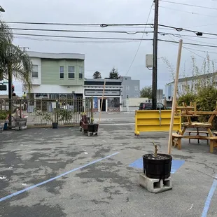 Closed off lot for the restaurant. I&apos;m guessing they have the tables down when the weather and county guidelines allow.
