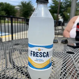 a bottle of fresca on a table