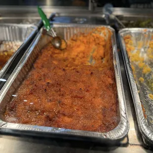 three pans of food