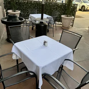 a table and chairs outside