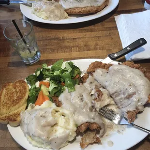 Chicken fried chicken was scrumptious.  So big I brought 1/2 of it come. My husband had the chicken fried steak was so good too.