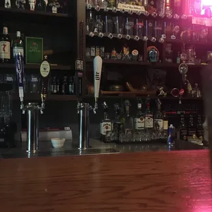 a bar with beer taps