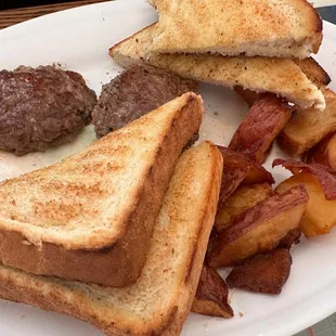 Toast and eggs and bacon and sausage