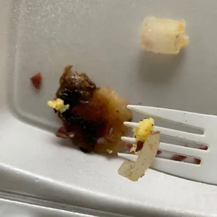 Burnt tasting potatoes under cooked onions. How???