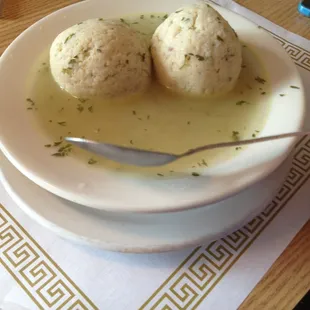 The bowl of homemade matzo ball soup - a huge serving and tastes delicious. Their salads are crisp and fresh too!