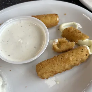 half eaten mozzarella sticks