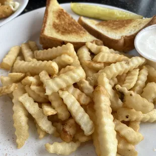 a plate of fries and a sandwich