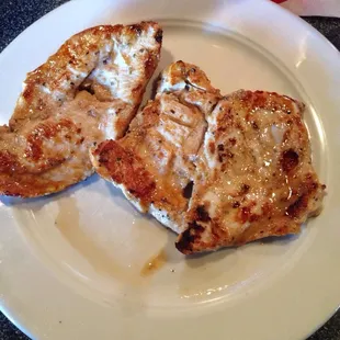 two pieces of grilled chicken