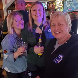 a group of women at a bar