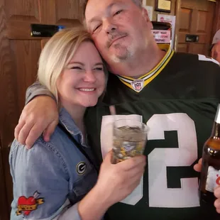 a man and a woman posing for a picture