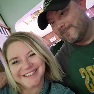 a man and a woman posing for a picture