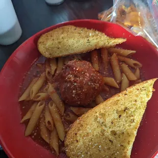 Kids mostaccioli with marina and a meatball.