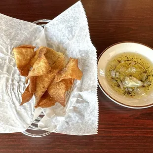 Complimentary Chips, Bread (Under the Chips) and Seasoned Olive Oil