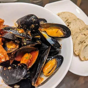 Yummy, plump mussels with slivered almonds and ciabatta cubes.