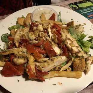 Grilled Chicken Caesar Salad, with beautiful roasted red peppers...Excellent dressing on the side.