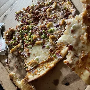 Apparently there was no bacon, but it can be put on one pizza and not the other