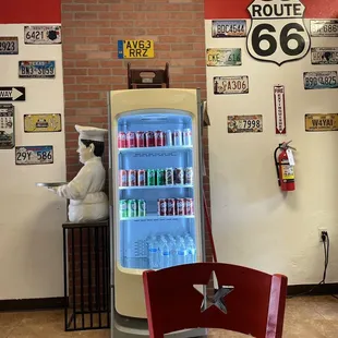 a man standing in front of a vending machine