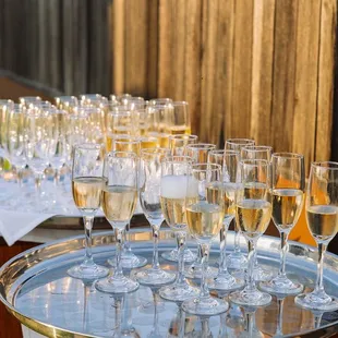 The wait staff prepared the champagne toast