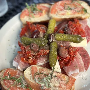 a plate of meat and vegetables