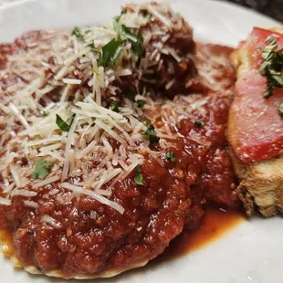 Portobello Ravioli :: Portobello Mushroom filled Ravioli  with Ragu and two Meatballs. This was so good and very filling!!