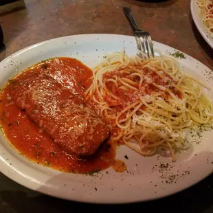 Italian meatloaf with a side of spaghetti marinara.