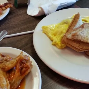 two plates of breakfast food