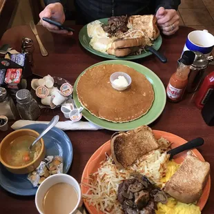 Steak and eggs. Coffee, chicken and rice coup. Pancake.