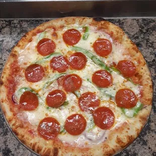 Personal pizza with pepperoni and peppers