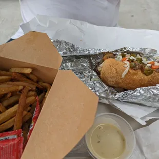 Italian beef and fresh cut fries with green chili cheese sauce.