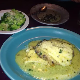 Seafood stuffed haddock and side of steamed broccoli with butter. Hot and freshly made (no steam table) and tastes FANTASTIC!