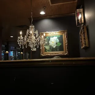 The booth next to us. Very private couldn't even see or hear the people. Love the chandelier and artwork on the walls. February 2023.