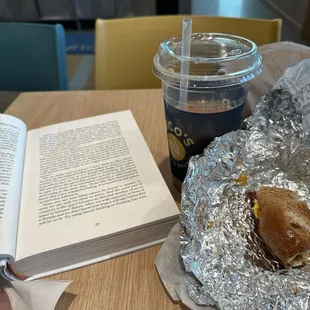 Bacon Egg and Cheese on a Sesame Bagel and a Booyah Iced Coffee.