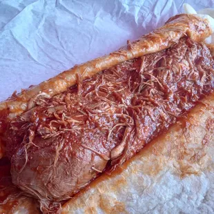 Red Chile chicken burrito with big chicks of chicken