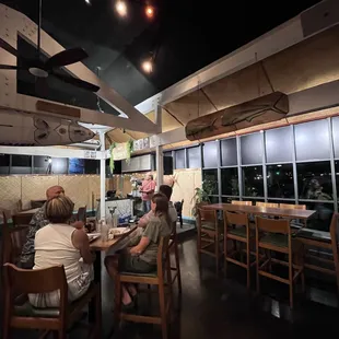 a group of people sitting at a table