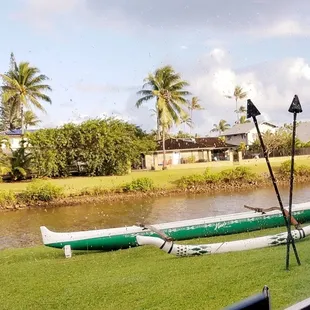 We prefer eating outside at the canal side picnic tables lit by tiki torches! Making myself hungry... gotta to go again the week!
