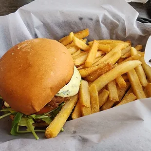 Crab cakes sandwich.  Crab patty a little small and got lost under the bun.