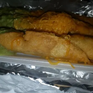 Yumm rolled tacos with guac and cheese