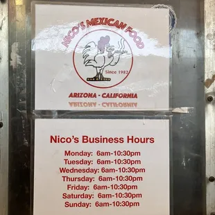 a sign for nicos business hours