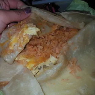 The wrong burrito- seems they got ONE part right. Rice and beans inside BUT inside a steak, egg and cheese breakfast burrito.