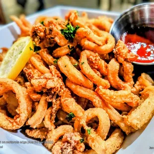 "Fried Calamari" Served Golden + Crispy w/ House-made Cocktail Sauce.