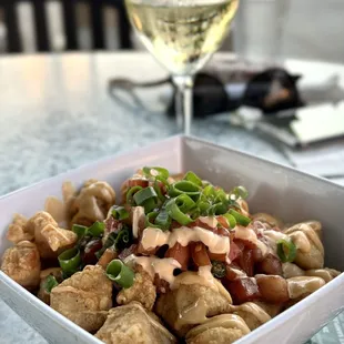 FISH BITES ** fried fish bites recipe served with lomi tomato and sriracha aioli