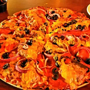 The Sharp Dressed Man Pizza with Black Olives