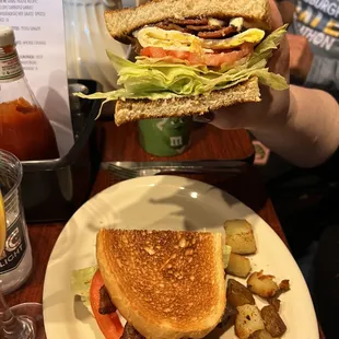 a sandwich and potatoes