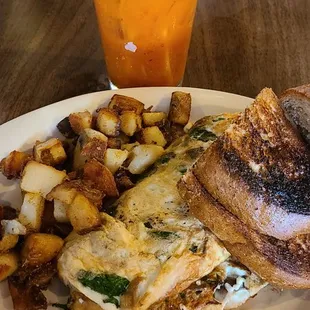 Omelette with potatoes and toast. Really good and really cheap!