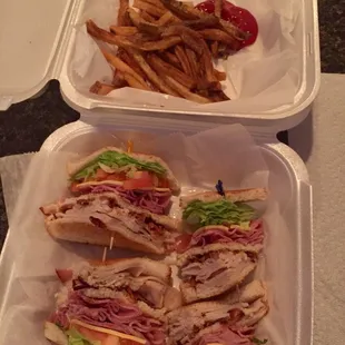 Club sandwich and fries.