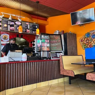 a man working behind the counter