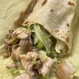 Polo asado burrito, just chicken breast, lettuce and sour cream.  Taste like a chicken salad in a tortilla