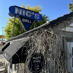 a sign on the roof of a restaurant