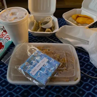 Thai tea, potstickers, mango sticky rice, pad Thai and face mask.