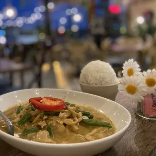 a bowl of soup and rice